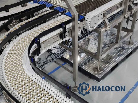 băng tải nhựa chạy cong