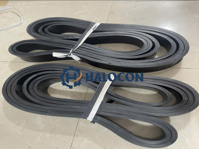 day-dai-keo-bun Dây đai kéo cáp, Haul-off belt, dây đai cao su đỏ, dây đai răng phủ cao su, phụ tùng máy đùn cáp điện.